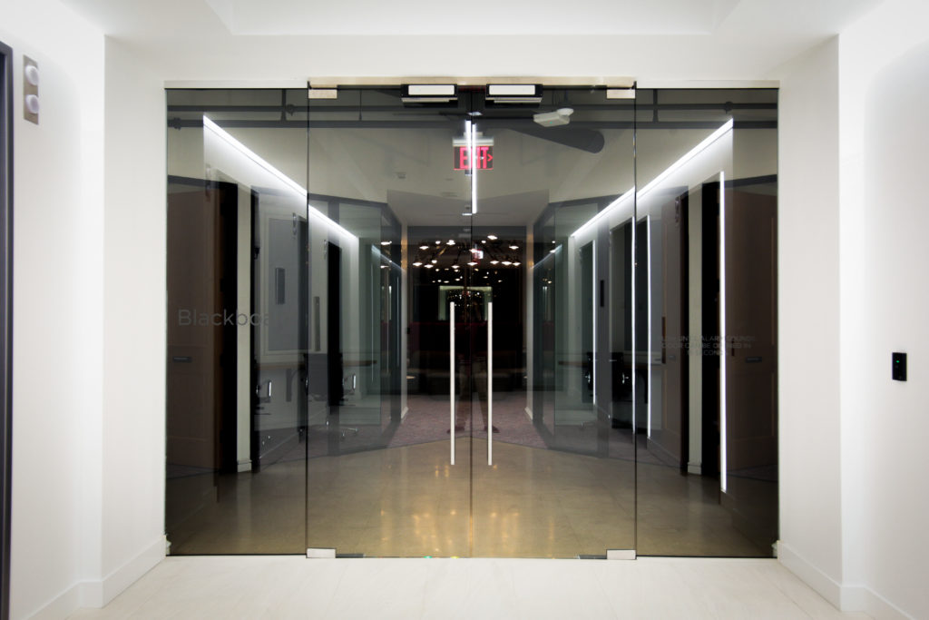 This image showcases the glass doors completed by Envision Glass.