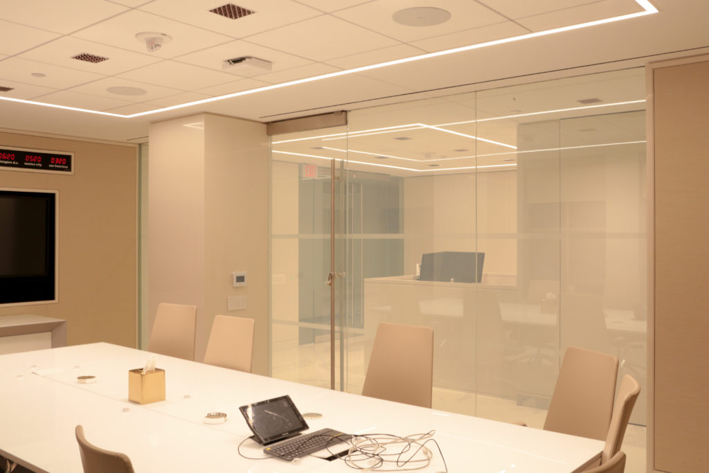 This shows the switchable glass in Temasek's conference room.